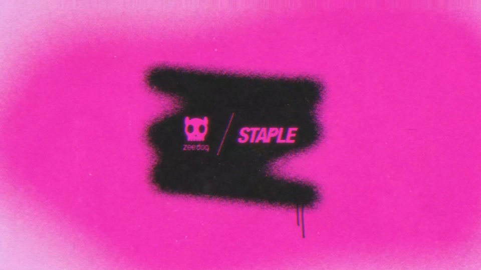 Zee.Dog and Staple logos over black spray paint on a textured pink background.